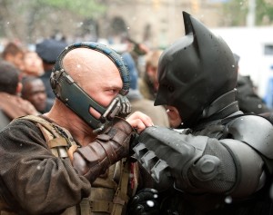Photo by Ron Phillips/Warner Bros. PicturesTOM HARDY as Bane and CHRISTIAN BALE as Batman clash. 
