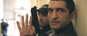 Universal Pictures Amr Waked as police Capt. Pierre Del Rio.
