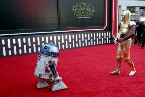 HOLLYWOOD, CA - DECEMBER 14:  R2-D2 (L) and C-3PO attend the World Premiere of “Star Wars: The Force Awakens” at the Dolby, El Capitan, and TCL Theatres on December 14, 2015 in Hollywood, California.  (Photo by Jesse Grant/Getty Images for Disney) *** Local Caption *** R2-D2;C-3PO